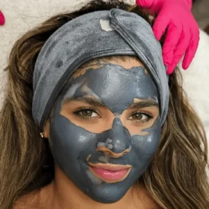 Woman enjoying a relaxing facial treatment at Danik MedSpa