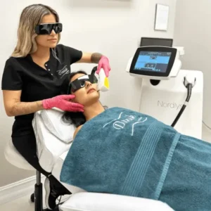 Professional applying Morpheus8 treatment for skin rejuvenation.